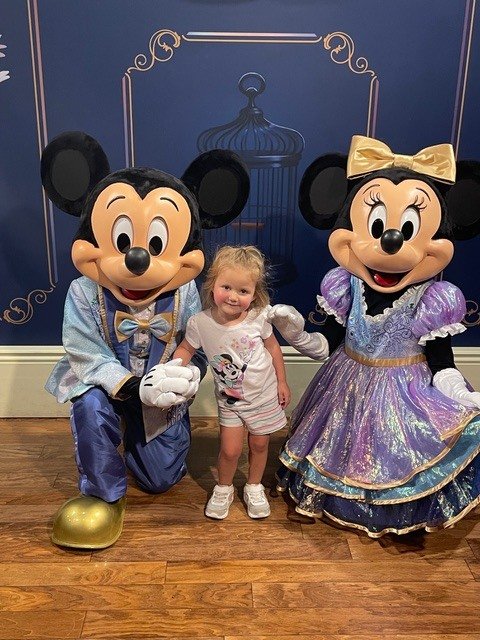 Kids are clicking photos with Disney Characters