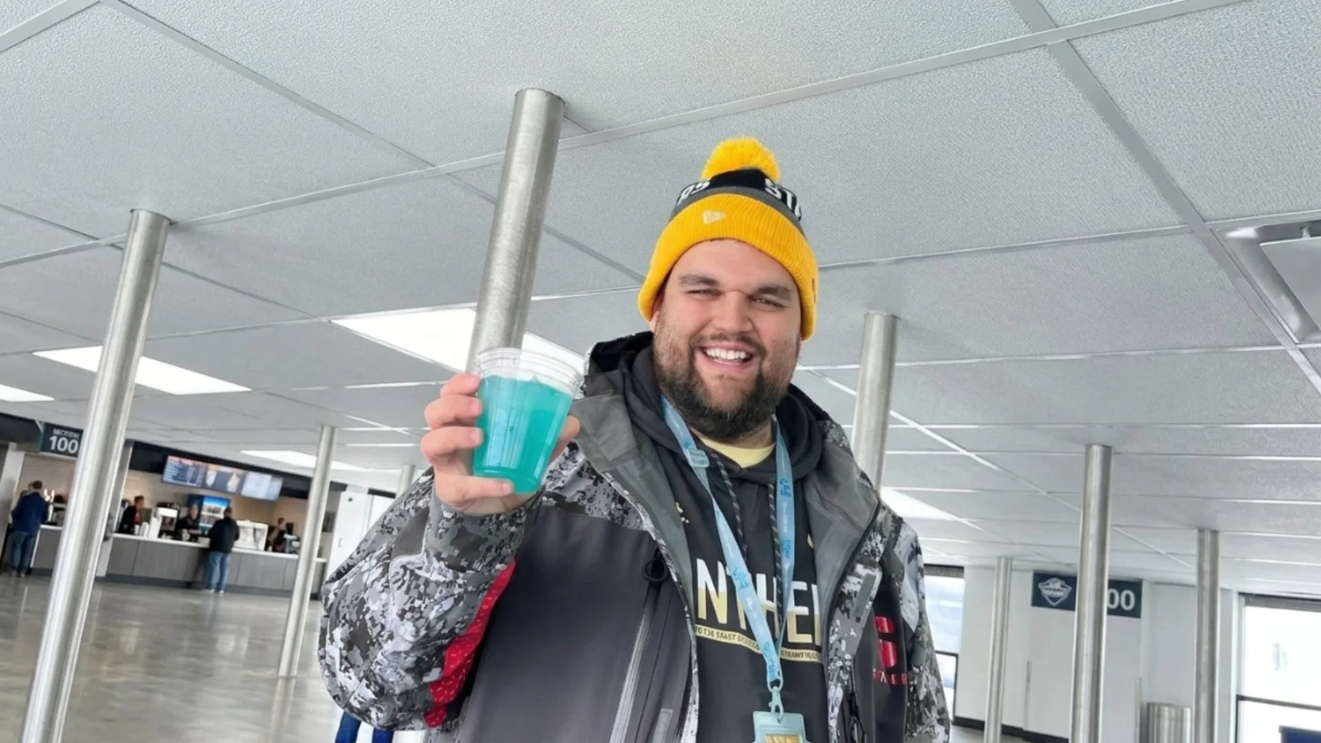 Disney Alaska cruise passenger enjoying a glacier ice drink made with fresh glacier ice during the Glacier Explorer excursion.